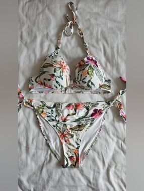 Cream-white bikini with a floral print